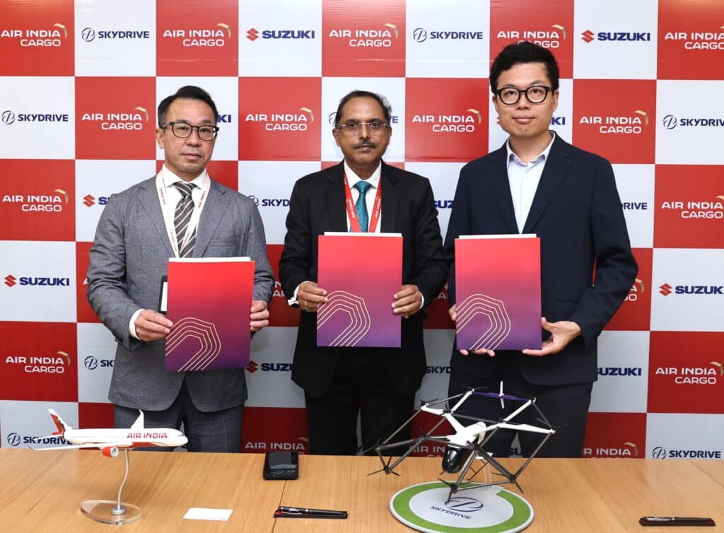 Air India SkyDrive Suzuki executives signing eVTOL medical logistics India MoU agreement ceremony