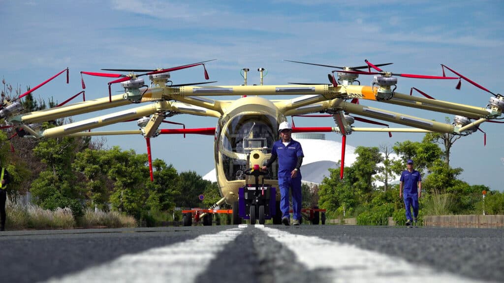 SkyDrive eVTOL aircraft charging at the 2025 Osaka Expo 